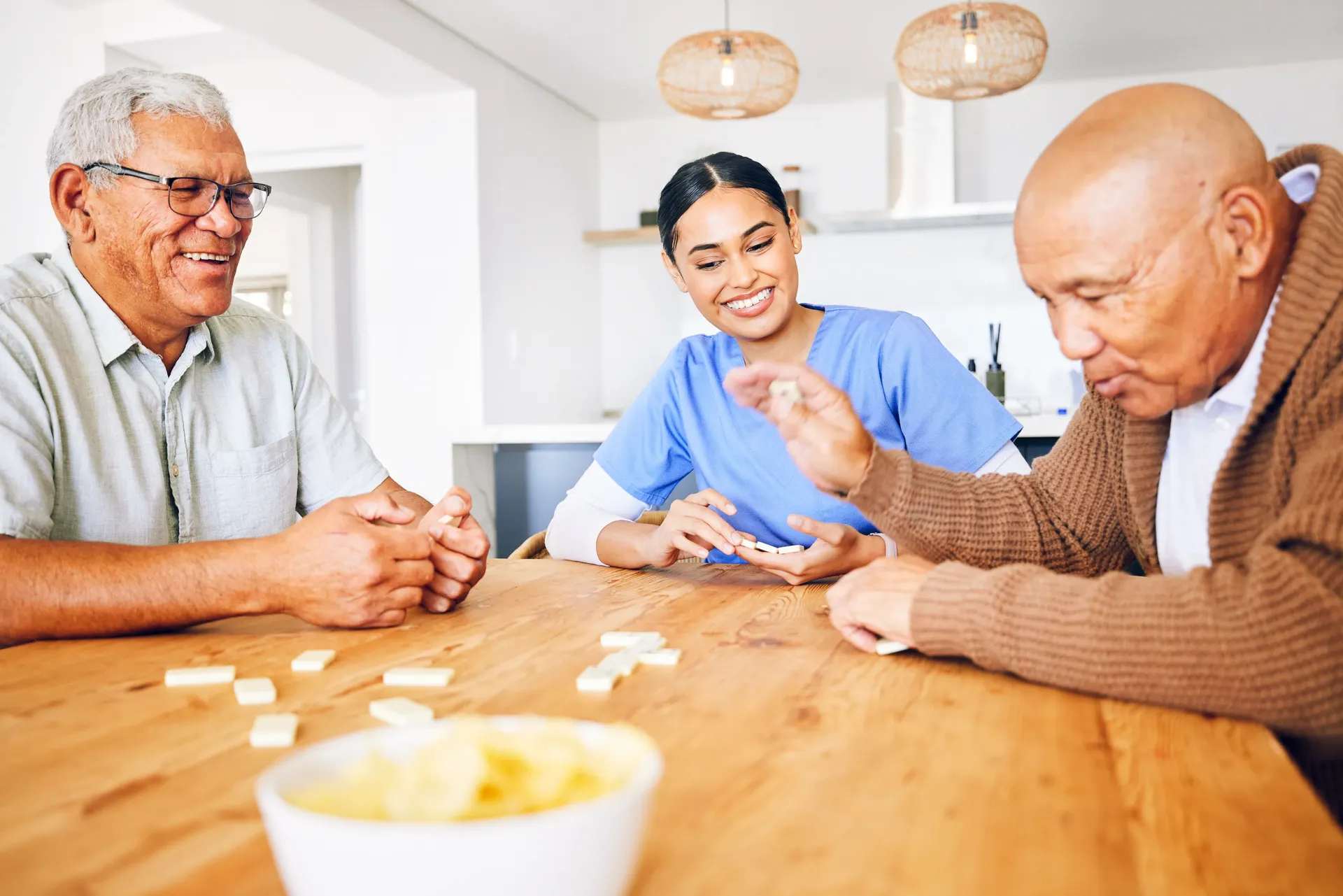 Caregiver assisting elderly woman with daily activities